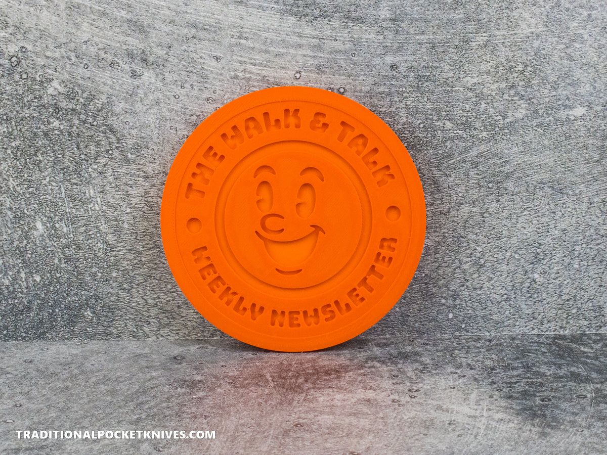 C. Risner Cutlery "The Walk & Talk Newsletter" Coaster - Orange