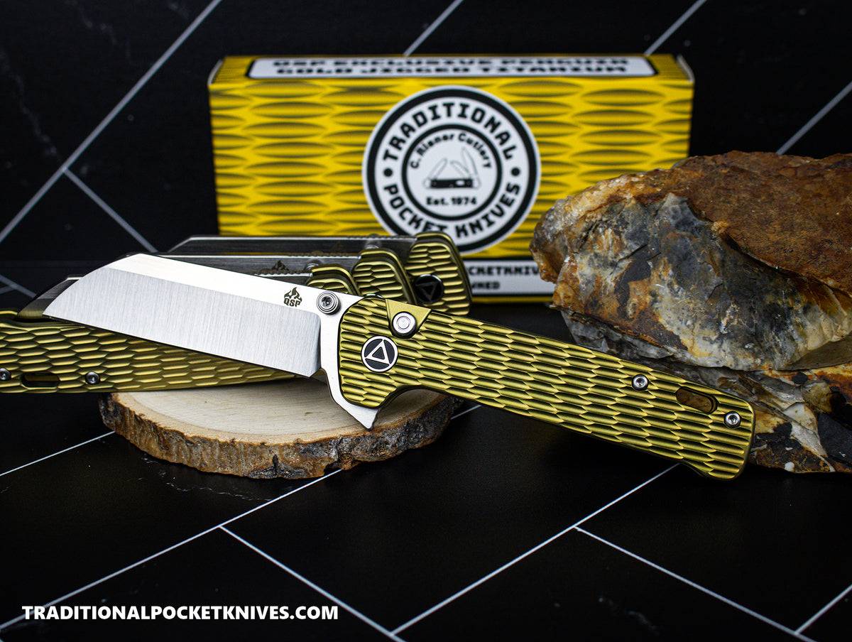 QSP Exclusive Penguin Button Lock Knife Gold Jigged Titanium