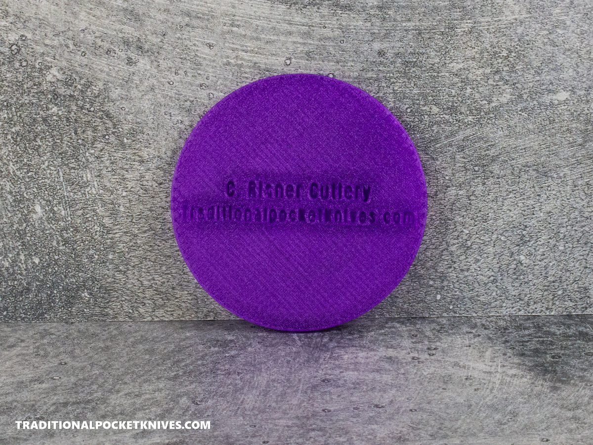 C. Risner Cutlery "The Walk & Talk Newsletter" Coaster - Purple