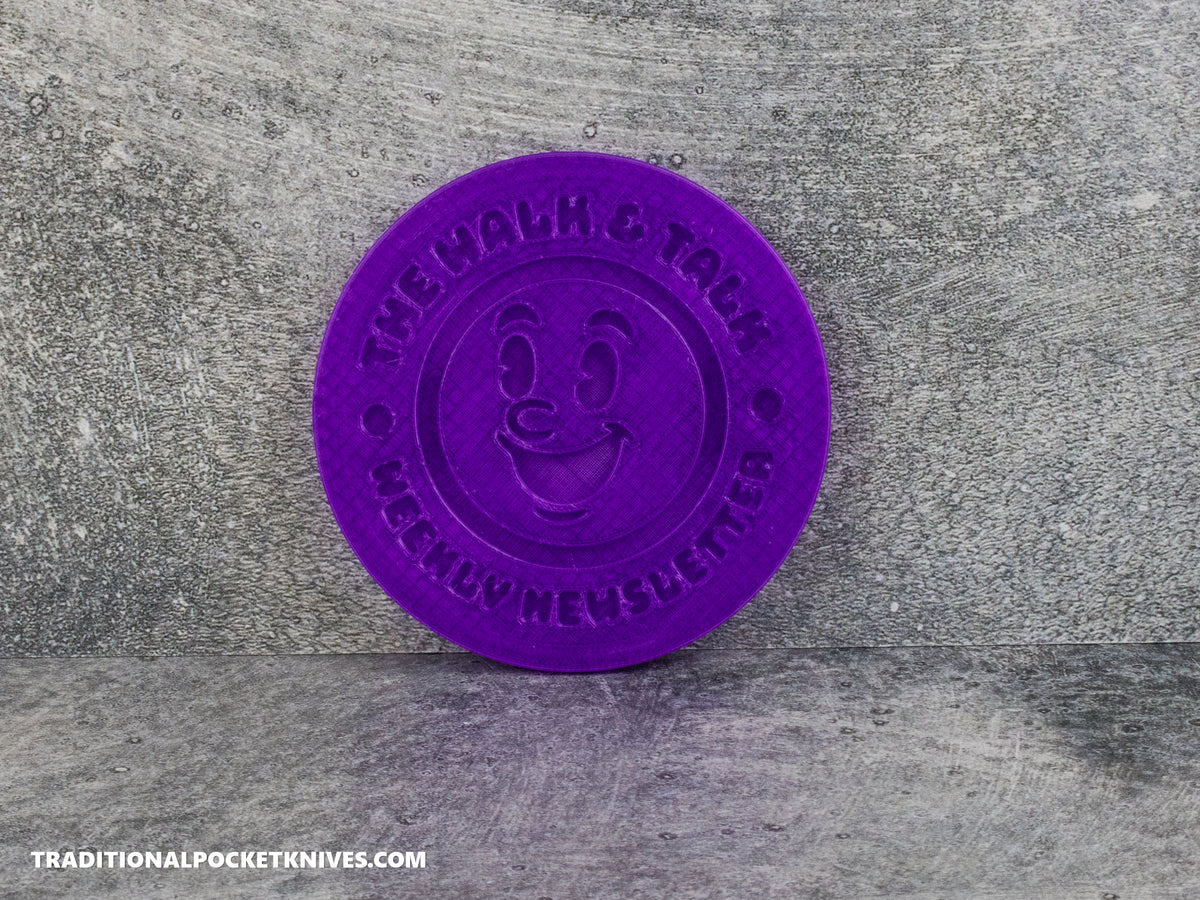 C. Risner Cutlery "The Walk & Talk Newsletter" Coaster - Purple
