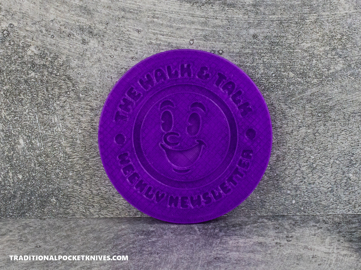 C. Risner Cutlery "The Walk & Talk Newsletter" Coaster - Purple