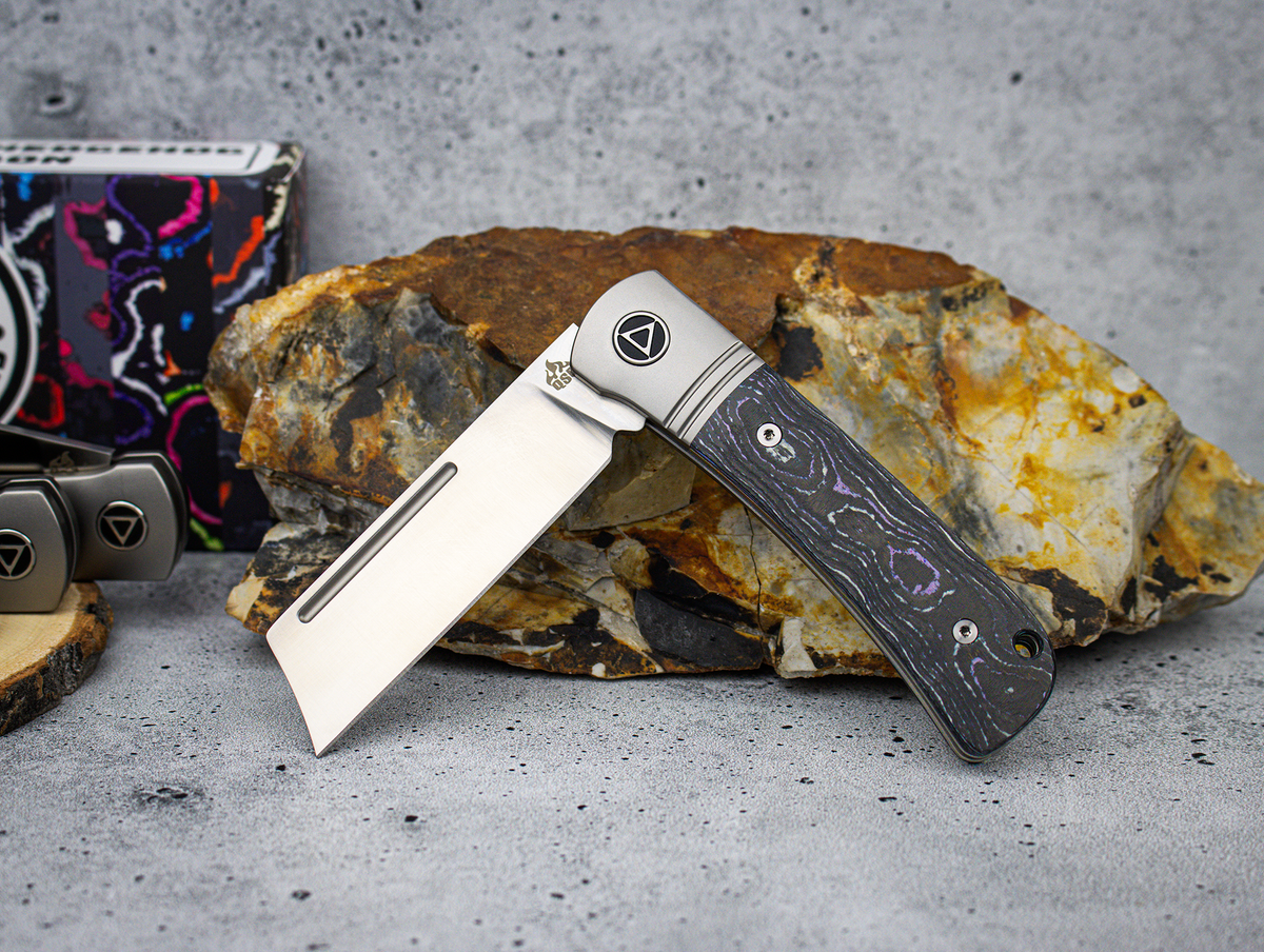 QSP Exclusive Hedgehog Knife QS142 CamoCarbon Purple Cow M390