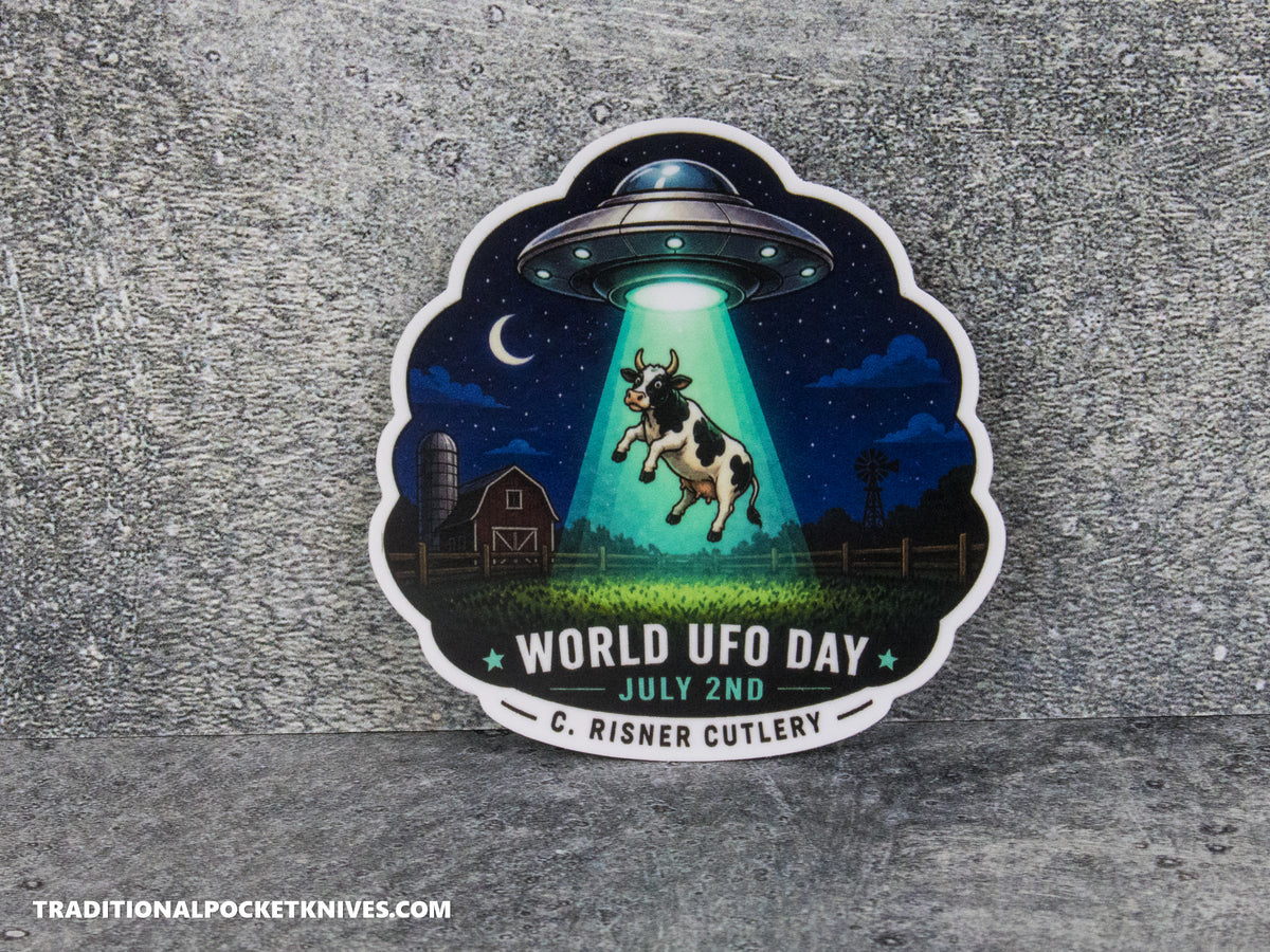 C. Risner Cutlery "World UFO Day Cow" Sticker