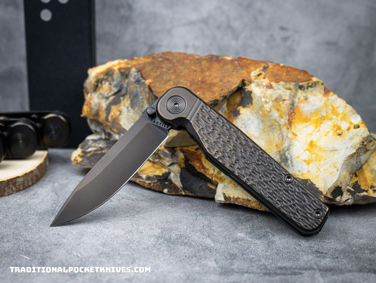 Tactile Knife Co. Exclusive Rockwall Thumbstud Black Jigged Titanium Magnacut DLC