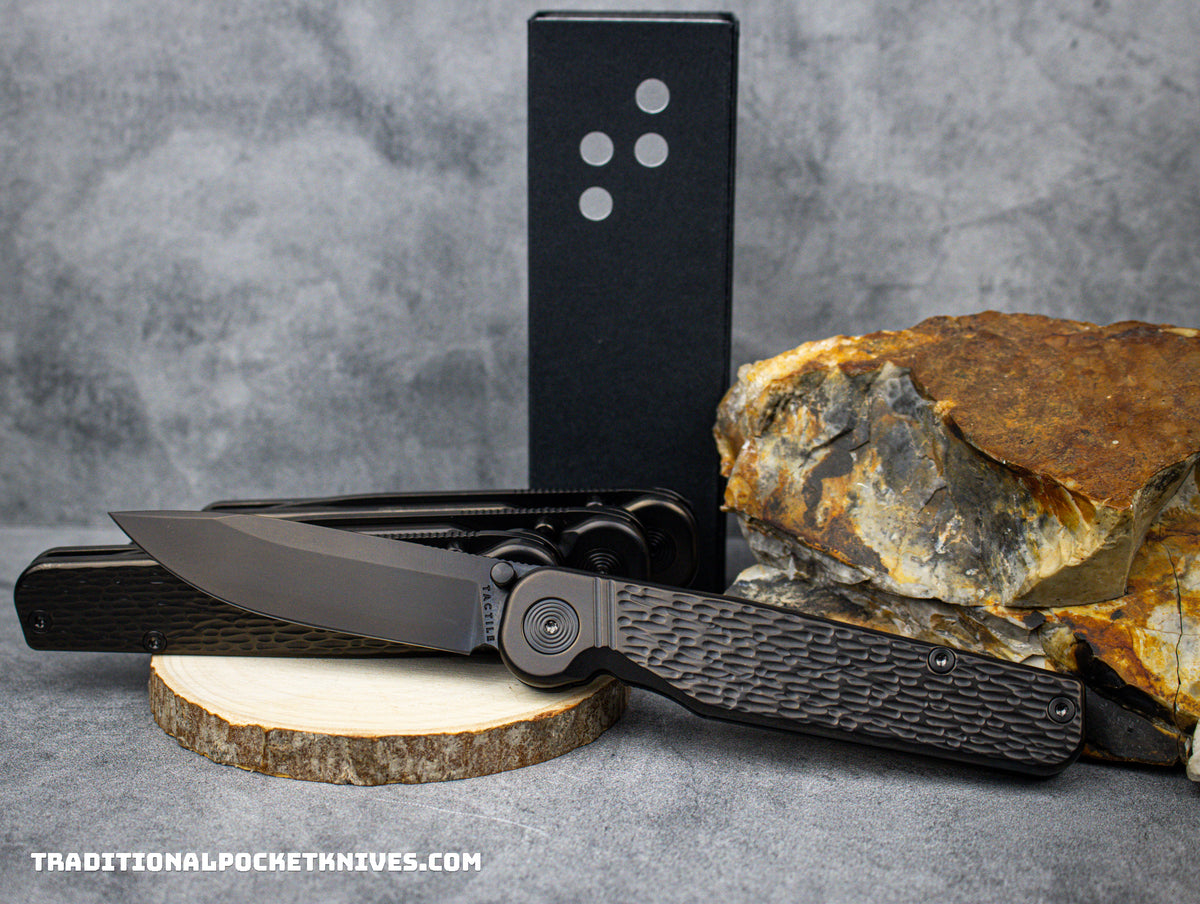 Tactile Knife Co. Exclusive Rockwall Thumbstud Black Jigged Titanium Magnacut DLC
