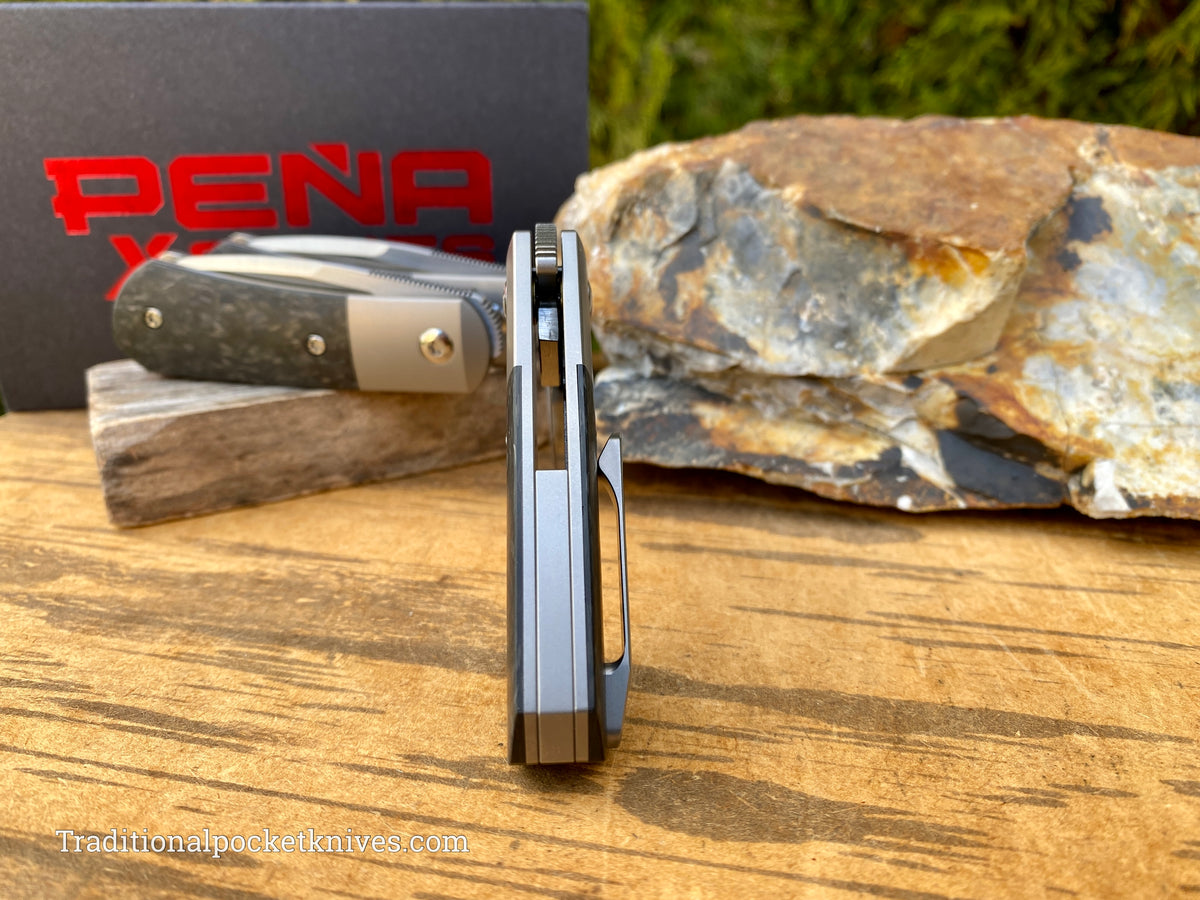 Pena Knives X Series Micro Apache Front Flipper Marble Carbon Fiber