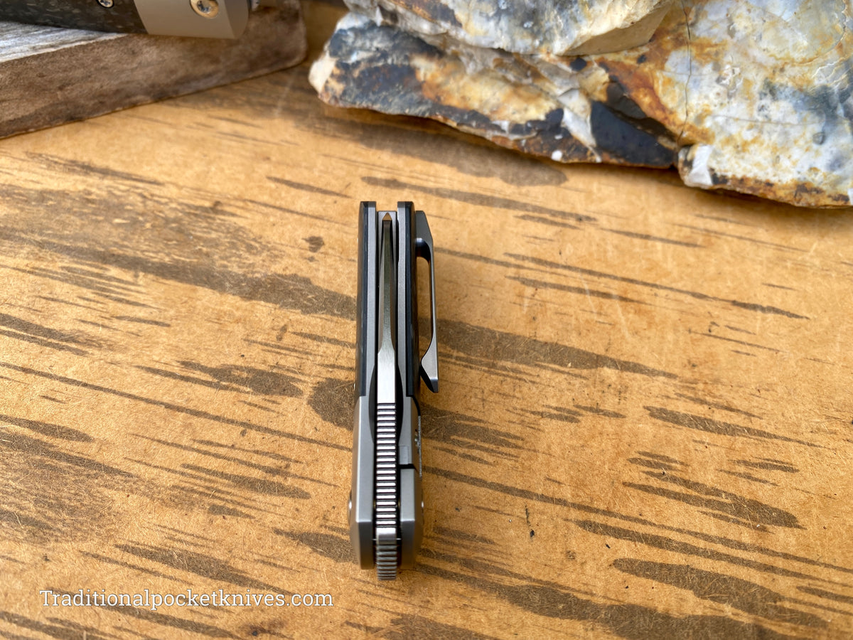 Pena Knives X Series Micro Apache Front Flipper Marble Carbon Fiber